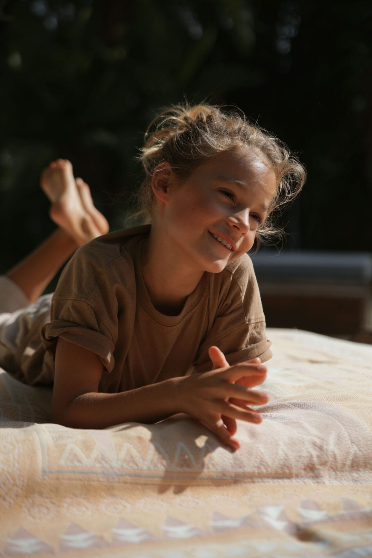 blond model boy smiling long hair summer laugh