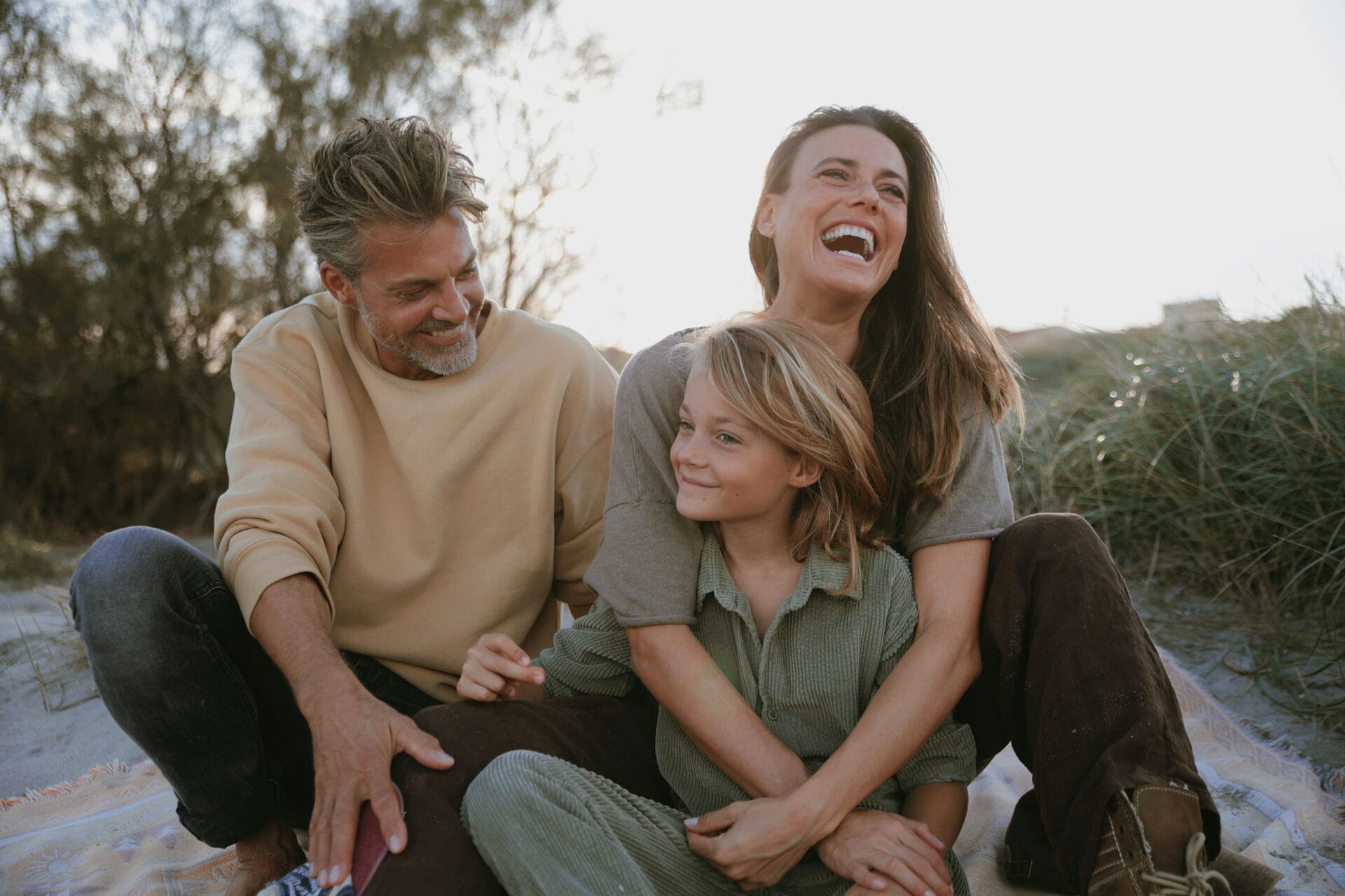 mallorca model family in nature laughing at the beach