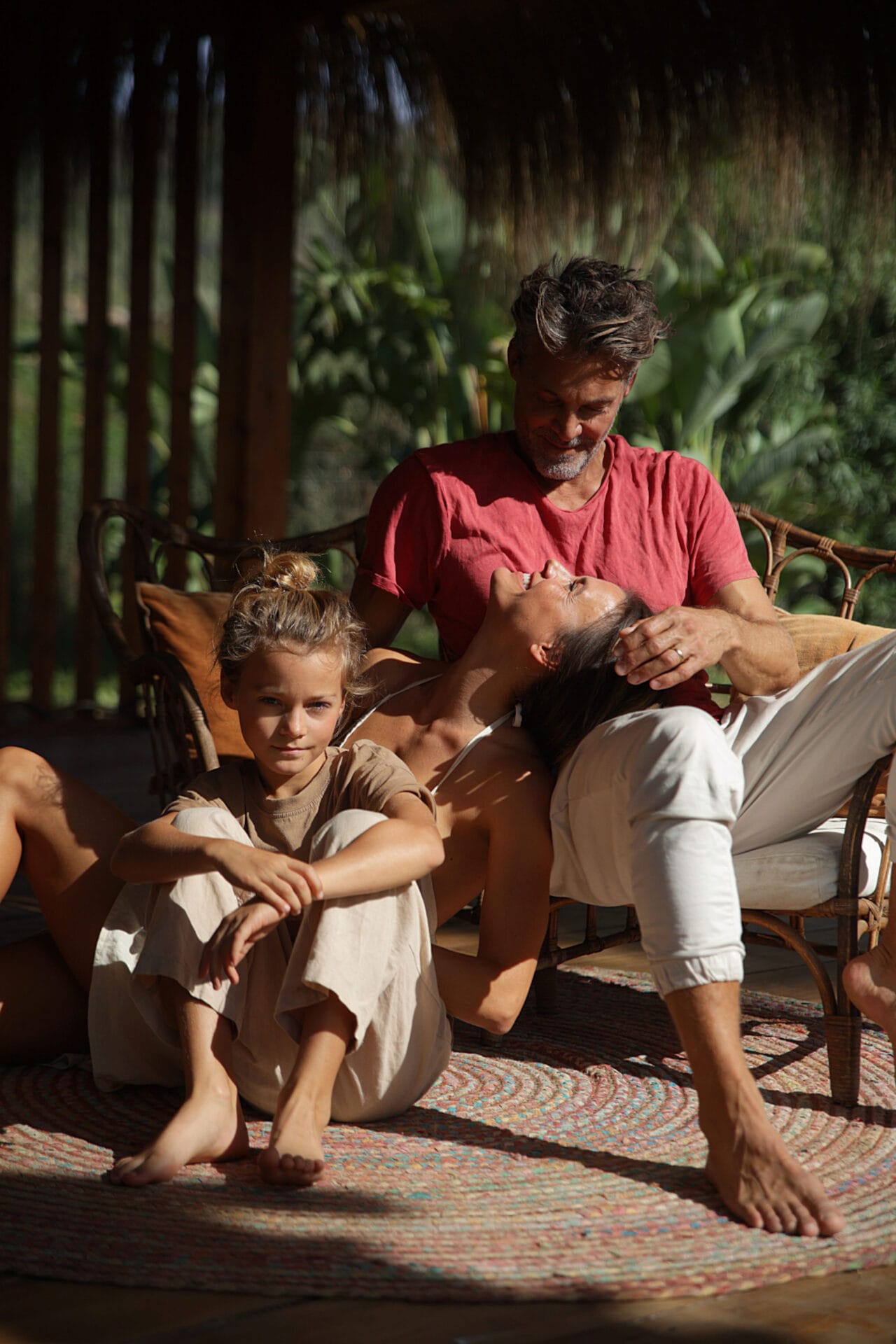 mallorca happy model family in garden sunlight