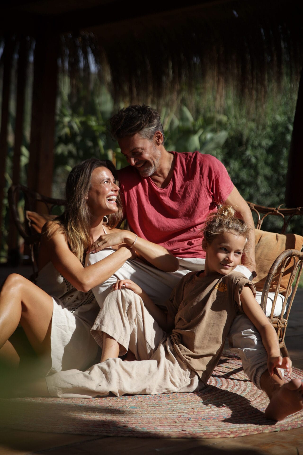mallorca happy model family in garden sunny