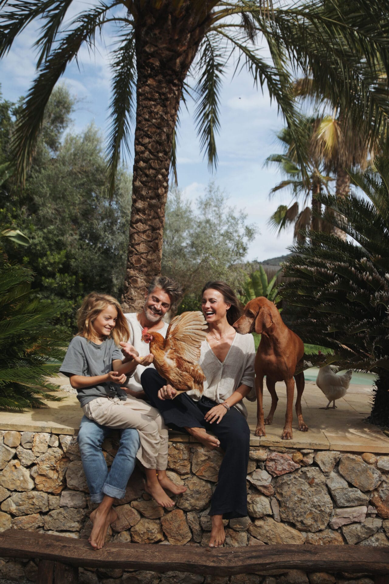 mallorca happy model family photoshoot dog chicken finca life